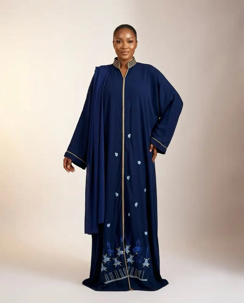 A navy chiffon Hadijat kaftan with hand embroidery